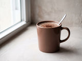 Sternen-Trinkschokolade in einer Tasse