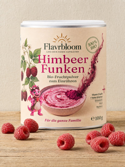 Himbeer Funken Dose von Flavrbloom auf Eichenholz, daneben frische Himbeeren